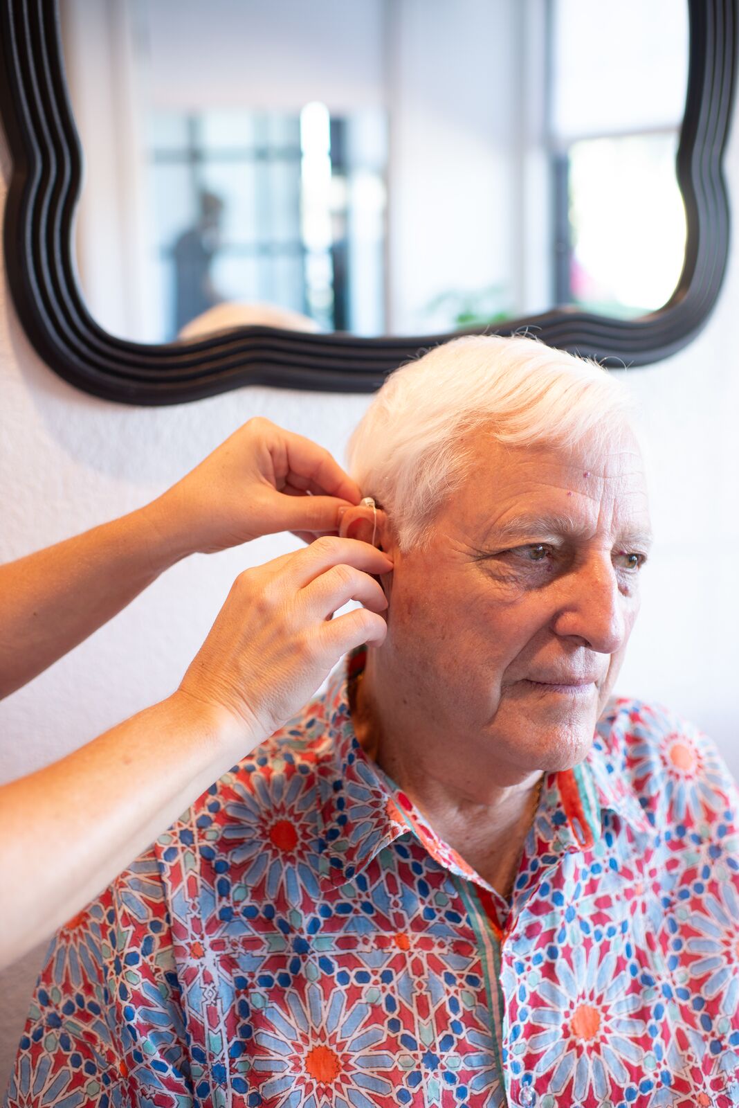 Patient receiving hearing care consultation
